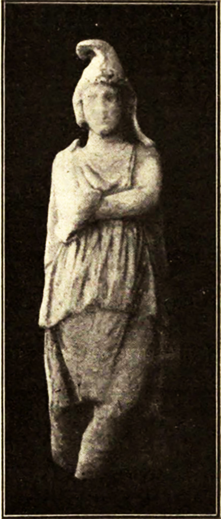 Vicolo del Menandro. May 1915. Mutilated marble statuette
Statuetta mutila, di marmo.
A few metres from the cast there is a mutilated marble statuette (0.51 m. high), of which we give a reproduction (fig. 5): it represents a male figure dressed in a knee-length chiton, a cloak and breeches, who stands upright with his legs crossed and, resting his right elbow on his left arm folded across his chest, brings his right hand to his chin. From the Phrygian cap covering his head, two ribbons descend sideways over his shoulders covered by a massive cloak with rather neglected folds.
See/Vedi Notizie degli Scavi di Antichità, 1915, p. 288-9, fig. 5.

