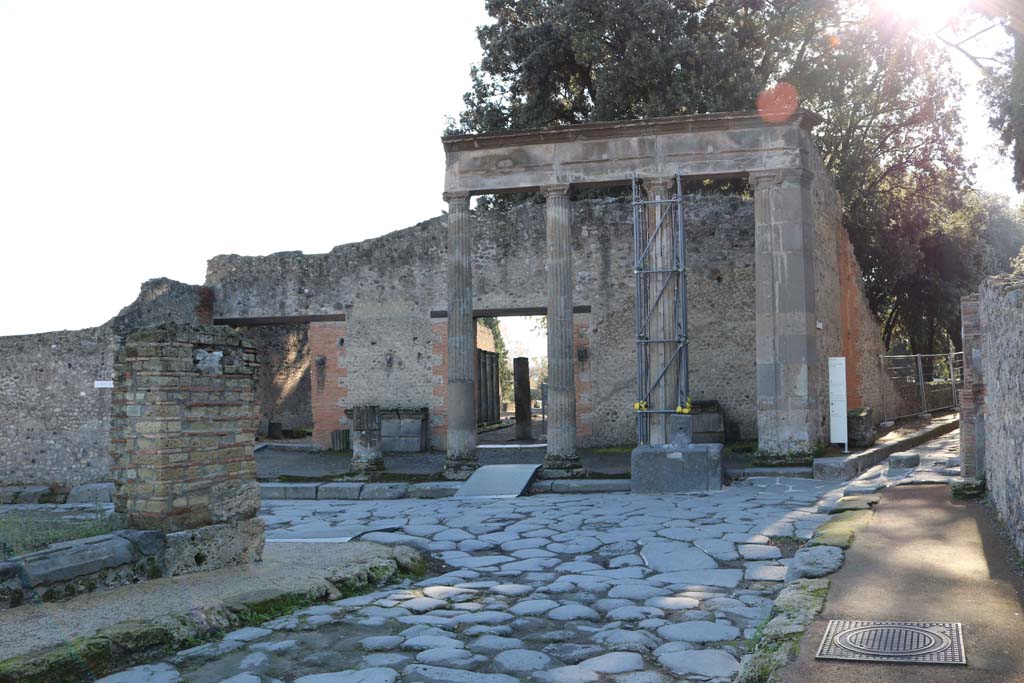 Fountain outside VIII.7.30 Pompeii on Via del Tempio dIside. December 2018. 
Looking south-east from Via dei Teatri across junction to fountain in Via del Tempio dIside. Photo courtesy of Aude Durand.


