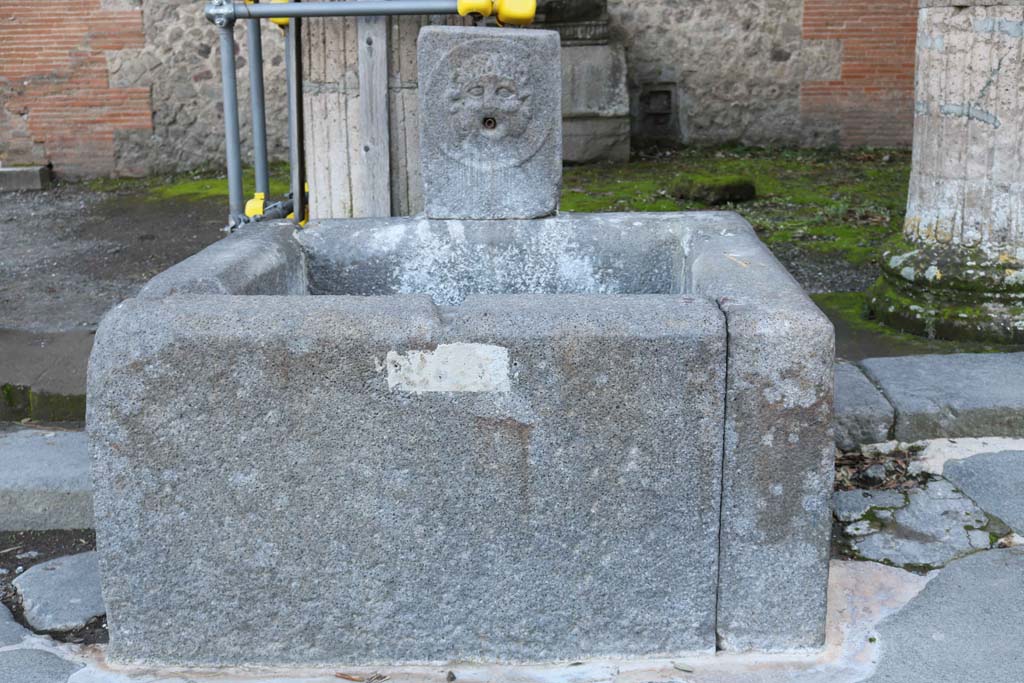 Fountain outside VIII.7.30 on Via del Tempio dIside. December 2018. Looking south. Photo courtesy of Aude Durand.

