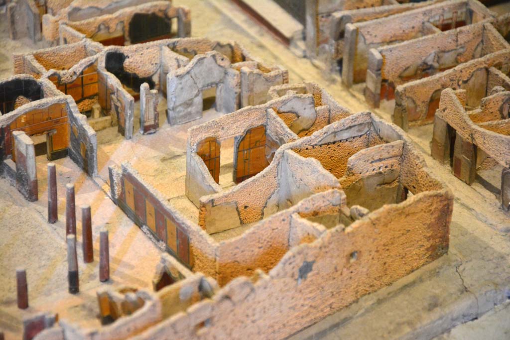 I.4.25 Pompeii. May 2019. Detail from model in Naples Archaeological Museum.
Looking north-west from above Vicolo del Citarista, bottom right, towards atrium and north portico of upper peristyle. 
The entrance corridor/fauces is on the upper centre right on the Via dellAbbondanza.
The north portico of upper peristyle 56 is on the left.
Foto Tobias Busen, ERC Grant 681269 DCOR

