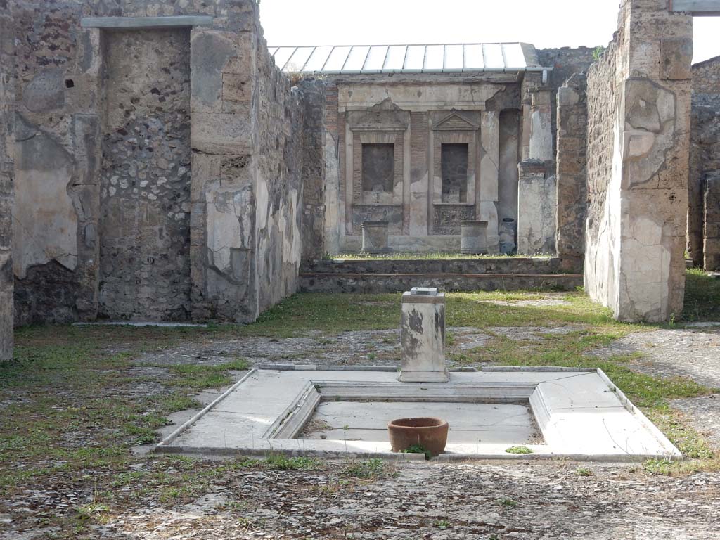 V.1.7 Pompeii. June 2019. Room 1, looking north across impluvium in atrium. Photo courtesy of Buzz Ferebee.