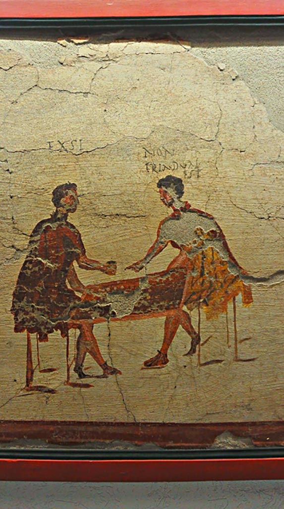 VI.14.35/36 Pompeii. June 2017. Fresco of a scene of gambling, from the north wall. 
On display in Naples Archaeological Museum, photo courtesy of Giuseppe Ciaramella. 
