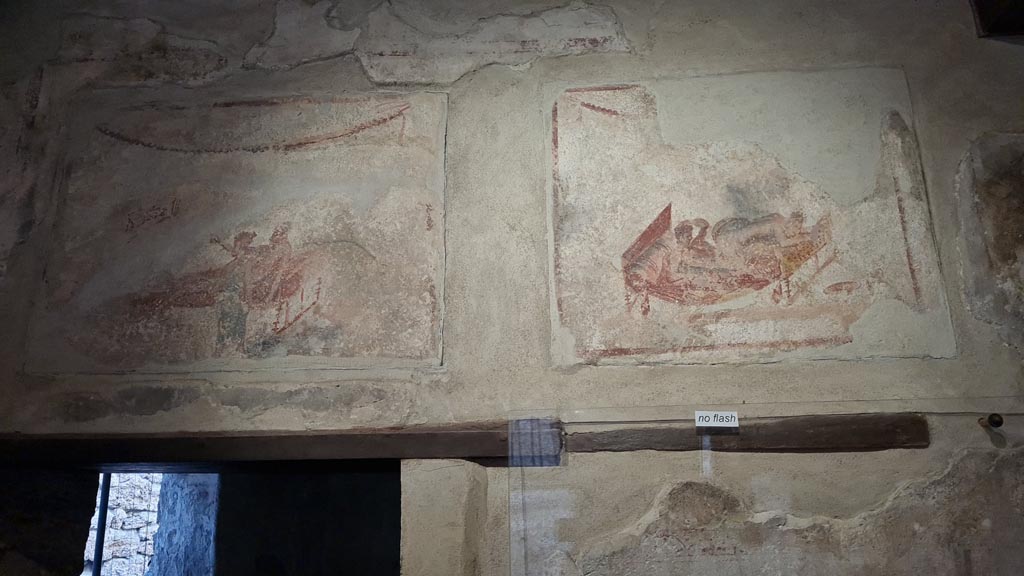 VI.12.18 Pompeii. April 2022. Erotic wall paintings on frieze on west wall. Photo courtesy of Giuseppe Ciaramella.