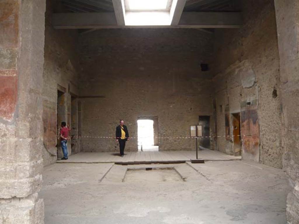 Villa of Mysteries, Pompeii. May 2012. Looking west from peristyle A, into room 64, atrium. Photo courtesy of Buzz Ferebee.
