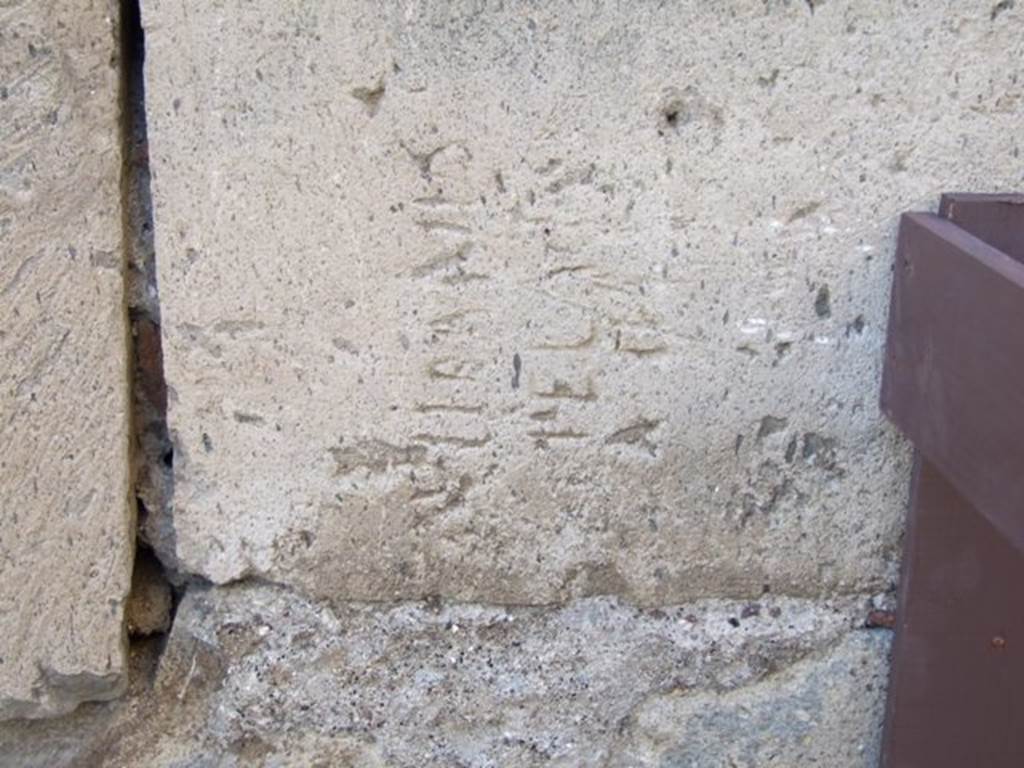 Vicolo degli Scheletri, south side near junction. December 2006. 
Stone block with inscription at corner of Vicolo della Maschera and Vicolo degli Scheletri. 
