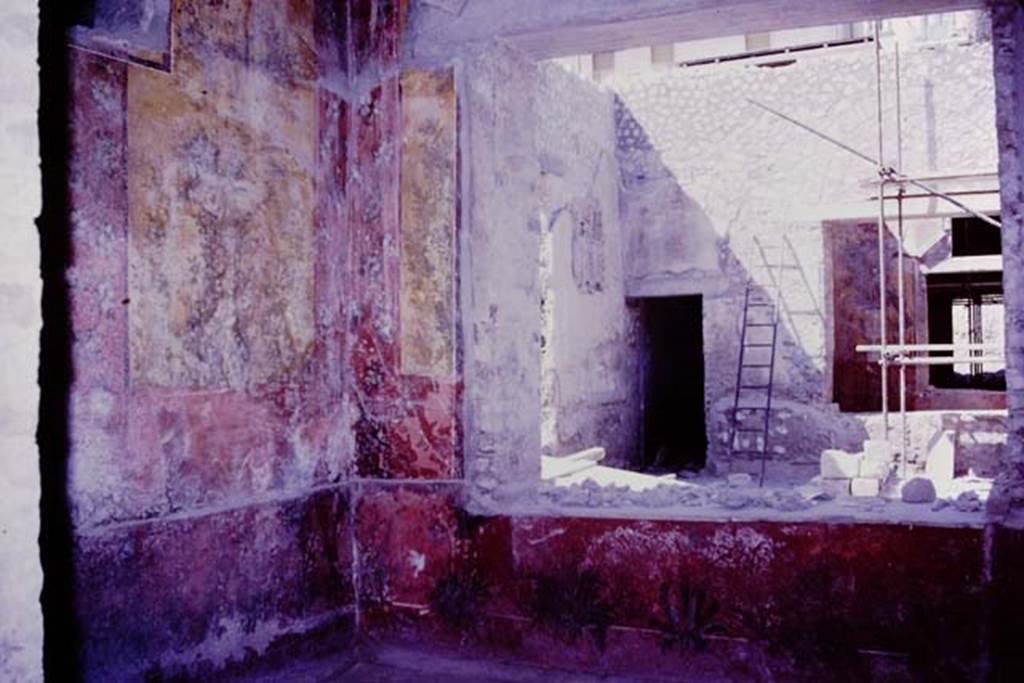 Oplontis, 1977. Room 68, north wall with window. Looking across room 69, to doorway of room 71, and window into small courtyard garden 70. Photo by Stanley A. Jashemski.   
Source: The Wilhelmina and Stanley A. Jashemski archive in the University of Maryland Library, Special Collections (See collection page) and made available under the Creative Commons Attribution-Non Commercial License v.4. See Licence and use details. J77f0370
