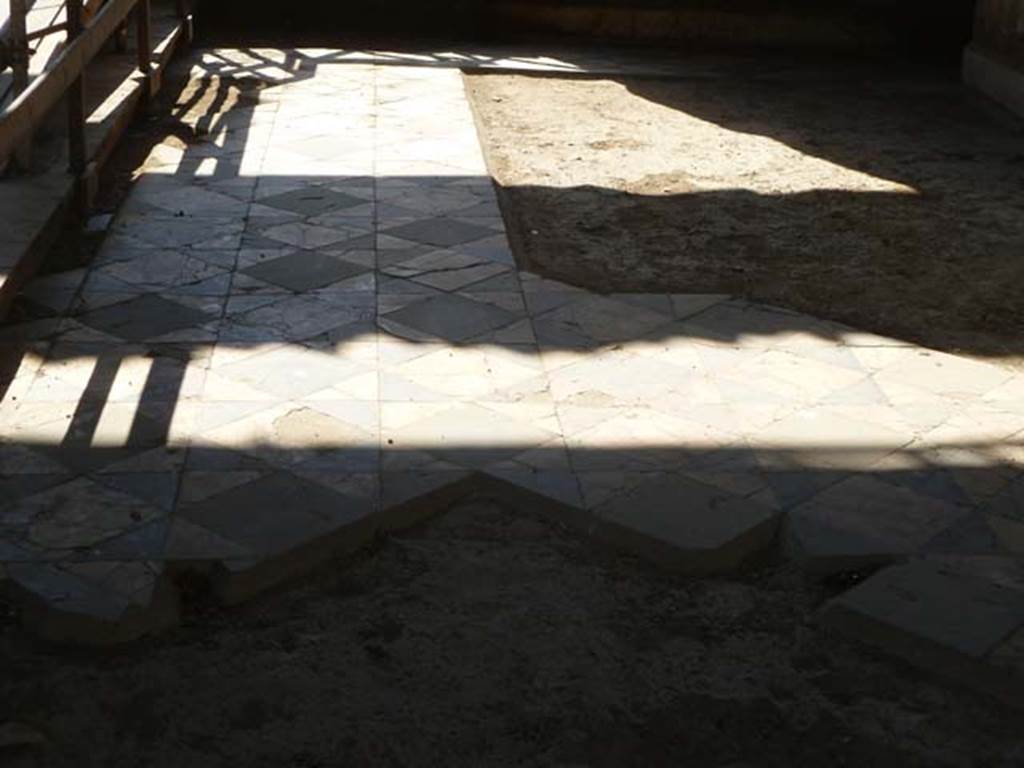 Oplontis, May 2011. Room 69, with decorative floor of opus sectile, looking west. 
Photo courtesy of Michael Binns.
