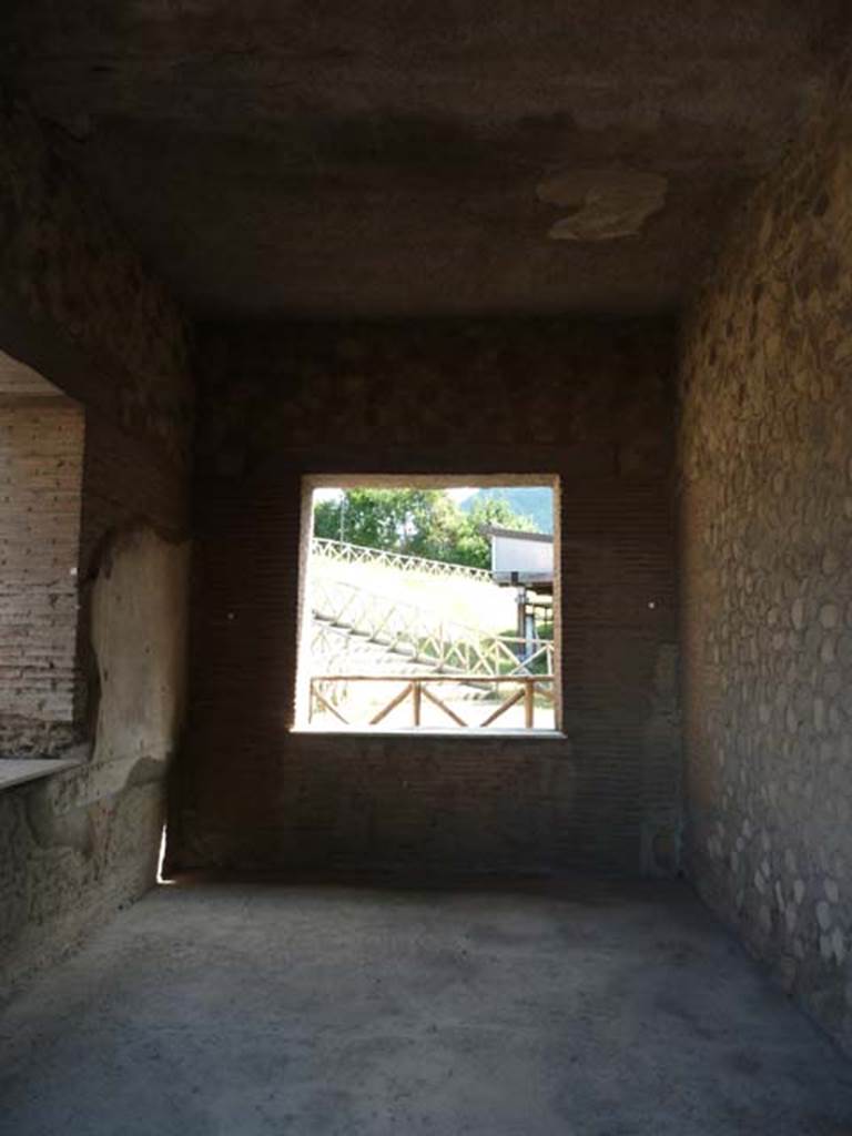 Stabiae, Villa Arianna, September 2015. Room E, looking south through window towards the unexcavated.