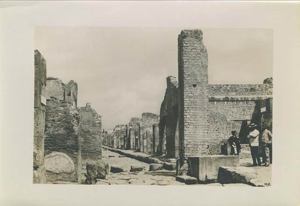 Fountain outside I.4.15 on Via Stabiana. Photograph by Sommer, numbered 182, c.1879. Looking north at Holconius crossroads, from between VIII.4 and I.4. Photo courtesy of Rick Bauer.

