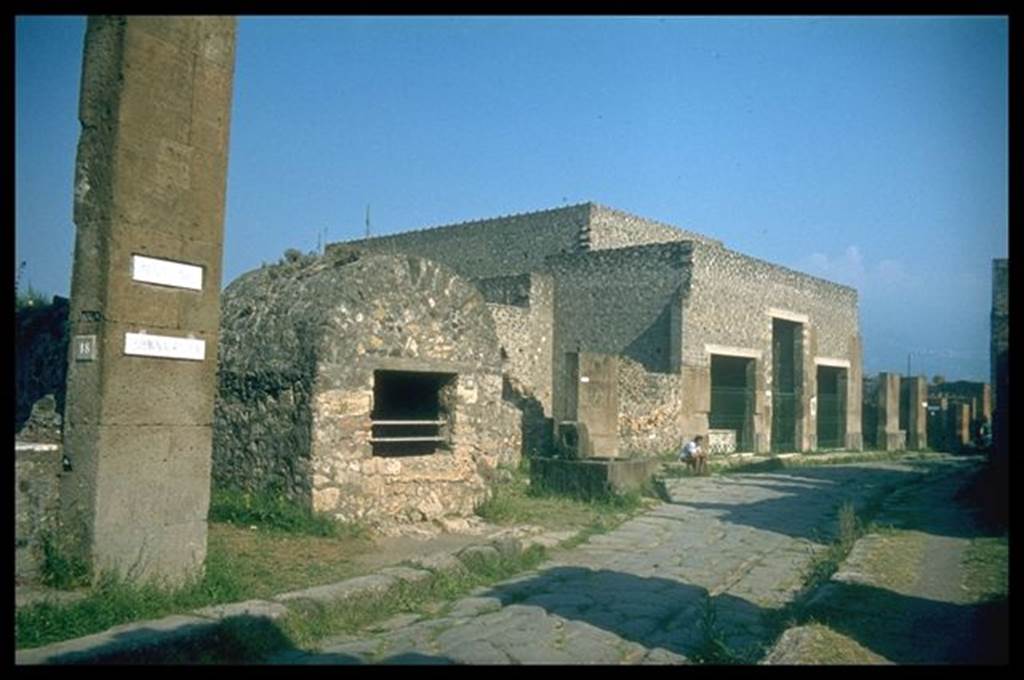 VI.1.19  Pompeii.  Well, fountain and House of Sallust. Looking south on Via Consolare.  Photographed 1970-79 by Günther Einhorn, picture courtesy of his son Ralf Einhorn.
