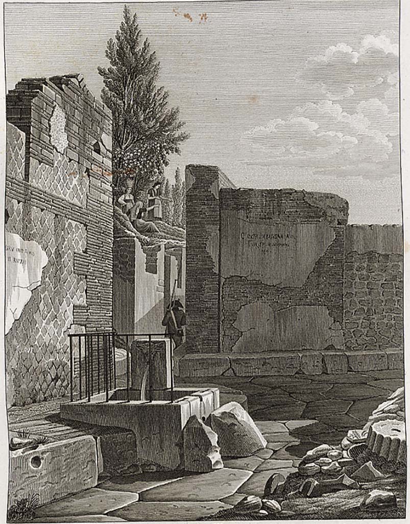Vicolo della Regina, Pompeii. Drawing by Mazois, looking west to junction with Vicolo dei Dodici Dei.
According to Mazois  this fountain was decorated with the head of a bull; but what made it remarkable was the iron balustrade which surrounded it at the side of the sidewalk to stop anyone falling into the basin.
The iron bars, already almost destroyed by rust during their discovery, could not resist for long the atmosphere of the air, they have disappeared, however there are still fragments embedded into the stone.
See Mazois, F., 1824. Les Ruines de Pompei : Second Partie. Paris: Firmin Didot, Pl. V, fig.1, and p. 38.
