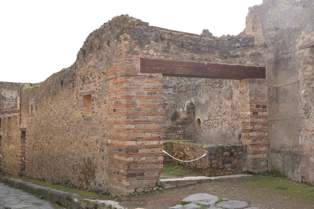 VII.12.15, Pompeii. December 2018. Looking south-west to entrance on Vicolo del Lupanare. Photo courtesy of Aude Durand.