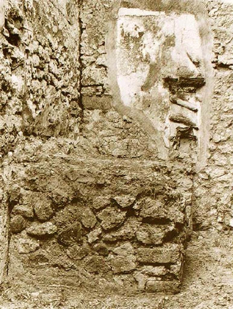 VII.15.13 Pompeii. 1978. Lararium above hearth in kitchen area. 