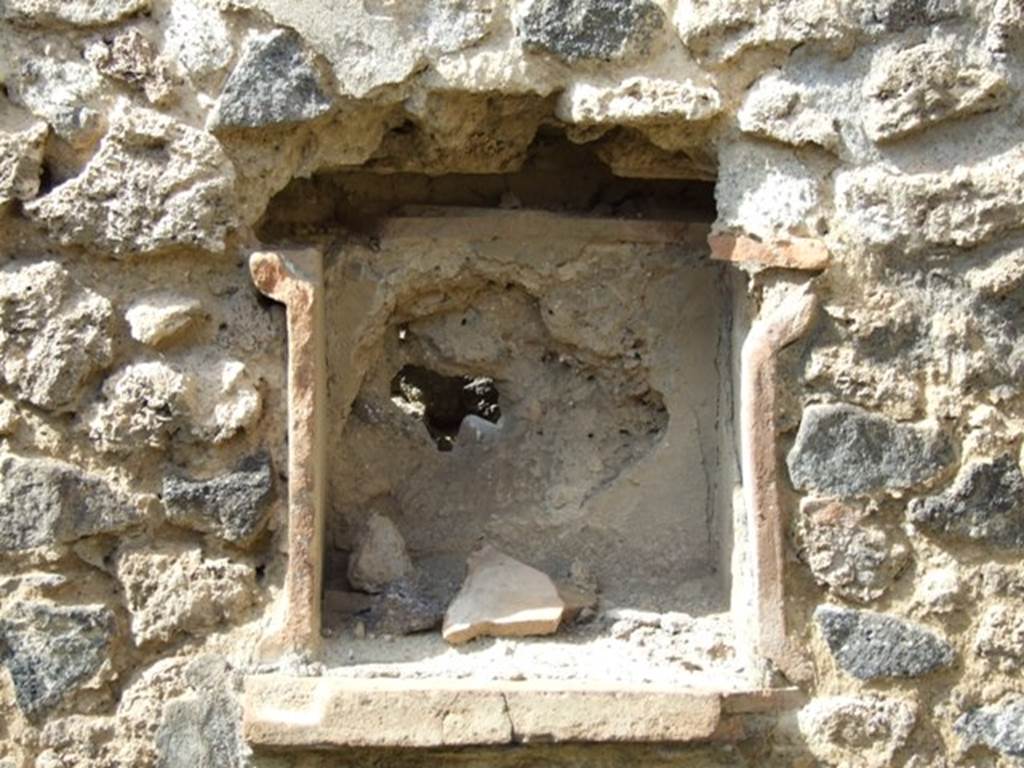 IX.2.5 Pompeii. March 2009. Niche lararium in north wall of garden. According to Boyce, this square niche was called la nicchia de’ Penati, by Fiorelli. See Boyce G. K., 1937. Corpus of the Lararia of Pompeii. Rome: MAAR 14. (p. 80)  See Pappalardo, U., 2001. La Descrizione di Pompei per Giuseppe Fiorelli (1875). Napoli: Massa Editore. (p.141)
