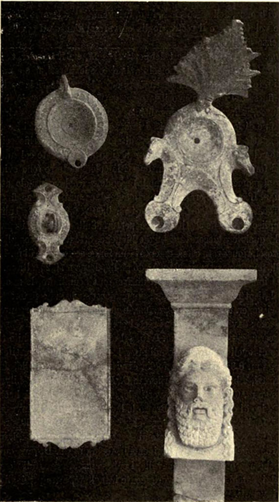 Boscoreale. Villa of Numerius Popidius Florus. Terracotta and marble finds.
From torcularium 17: Three clay oil-lamps found in front of the lararium.
From room 11: An alabaster tray and a marble monopodium with a bearded head.
See Notizie degli Scavi di Antichità, 1921, p. 457 fig. 19.
See Garcia y Garcia L., 2017. Scavi Privati nel Territorio di Pompei. Roma: Arbor Sapientiae, p. 395, fig. 232.

