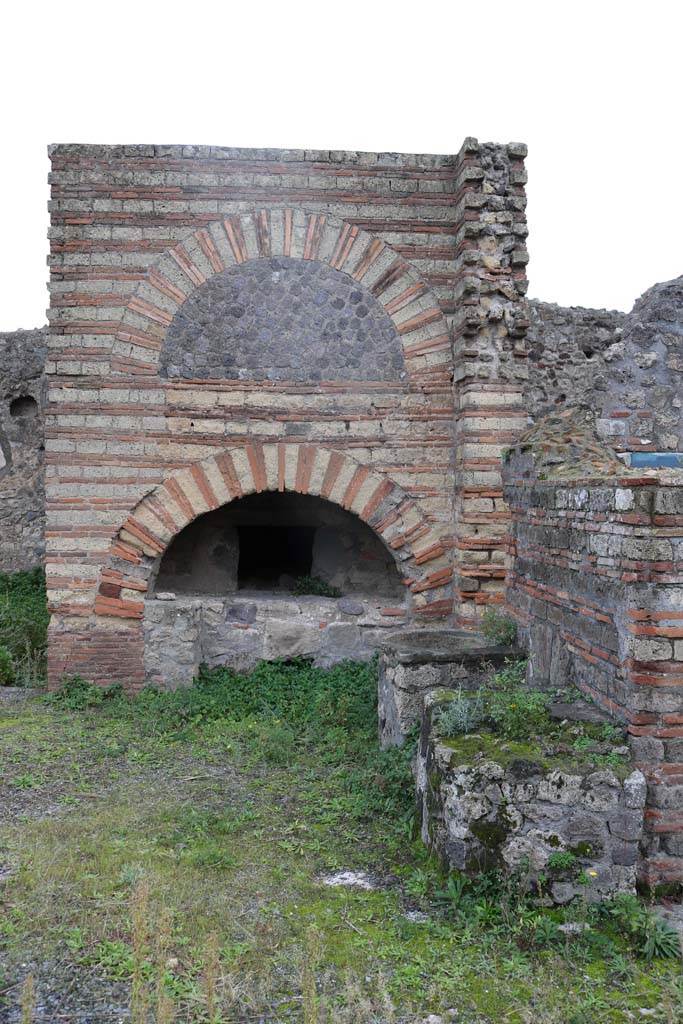 VI.3.3 Pompeii. December 2018. 
Room 7, looking south across site of household shrine towards oven. Photo courtesy of Aude Durand.
