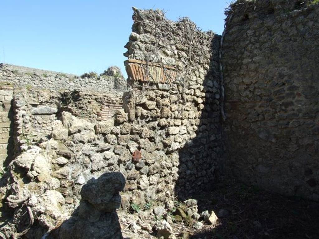 I.3.27 Pompeii.  March 2009. Small room on west side of Oven. East wall.