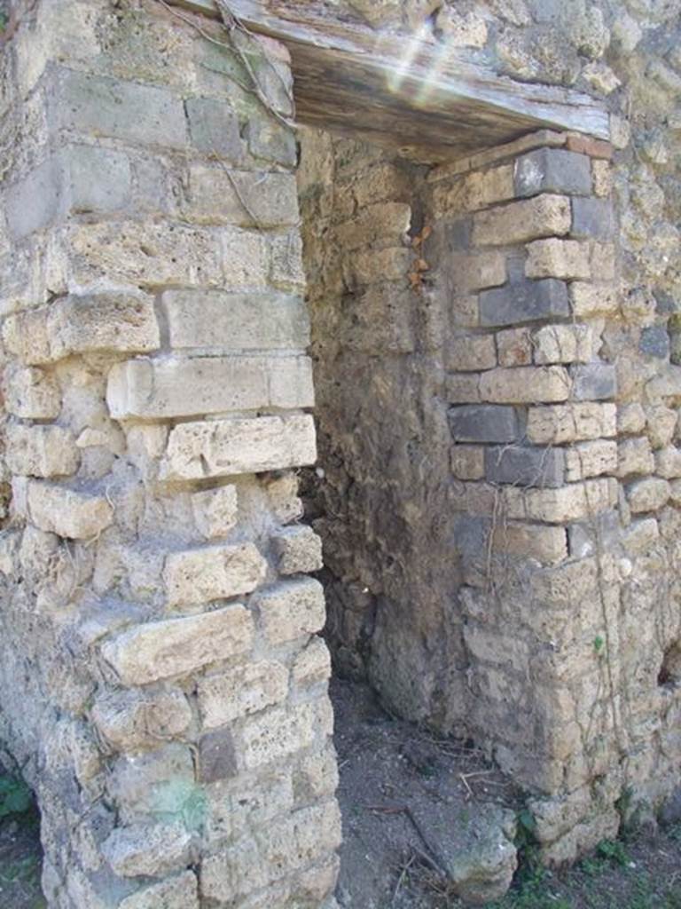 I.3.27 Pompeii.  March 2009.  Doorway to Latrine.