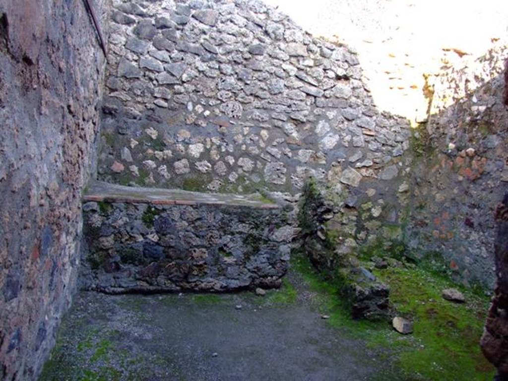 I.6.4 Pompeii. March 2009. Room 8, east wall with hearth and latrine.