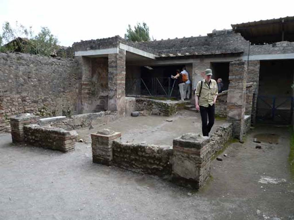 I.6.7 Pompeii. May 2010. Looking south-east across garden area.