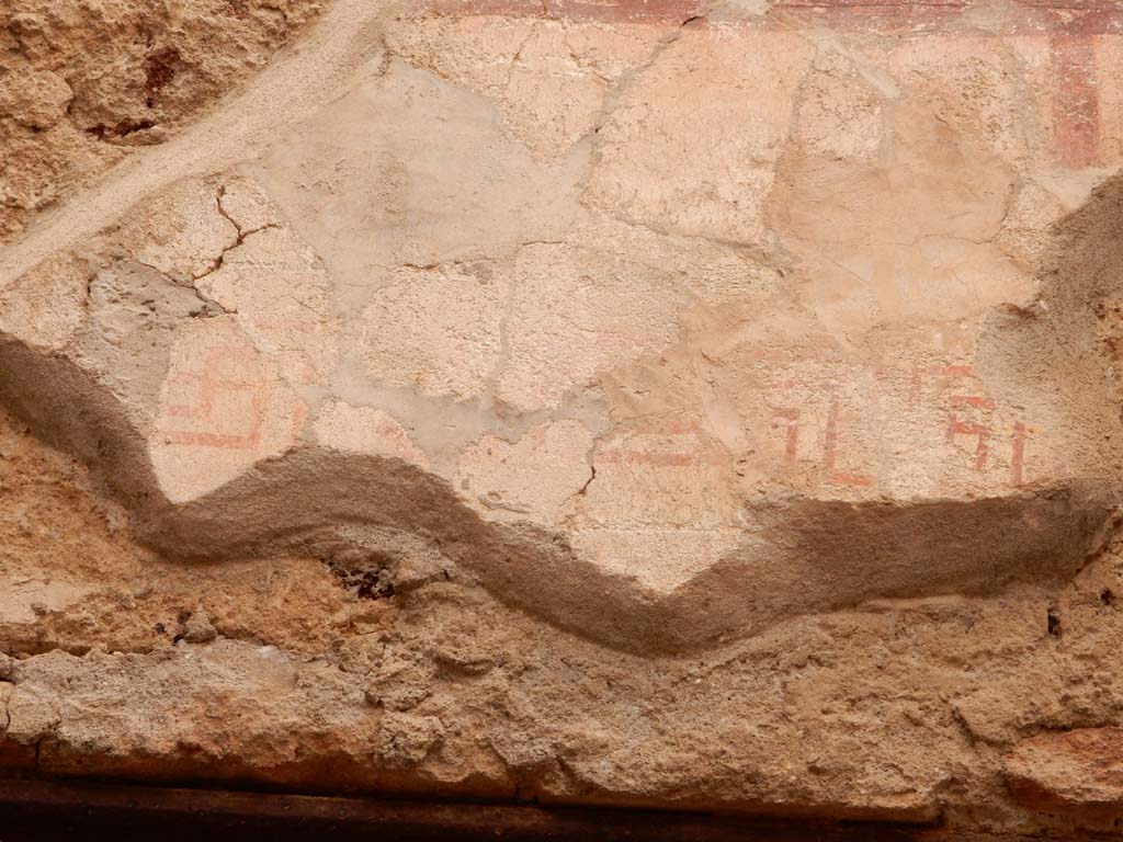 I.6.15 Pompeii. June 2019. Room 8, detail from above window on upper north wall. Photo courtesy of Buzz Ferebee.

