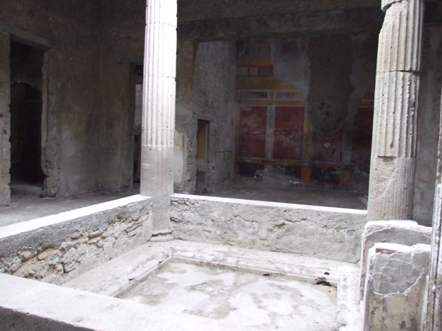 I.8.17 Pompeii. March 2019. 
Room 3, atrium, looking north-west across impluvium towards entrance doorway, doorway to rooms 15, 14 and 13. 
Foto Annette Haug, ERC Grant 681269 DCOR.

