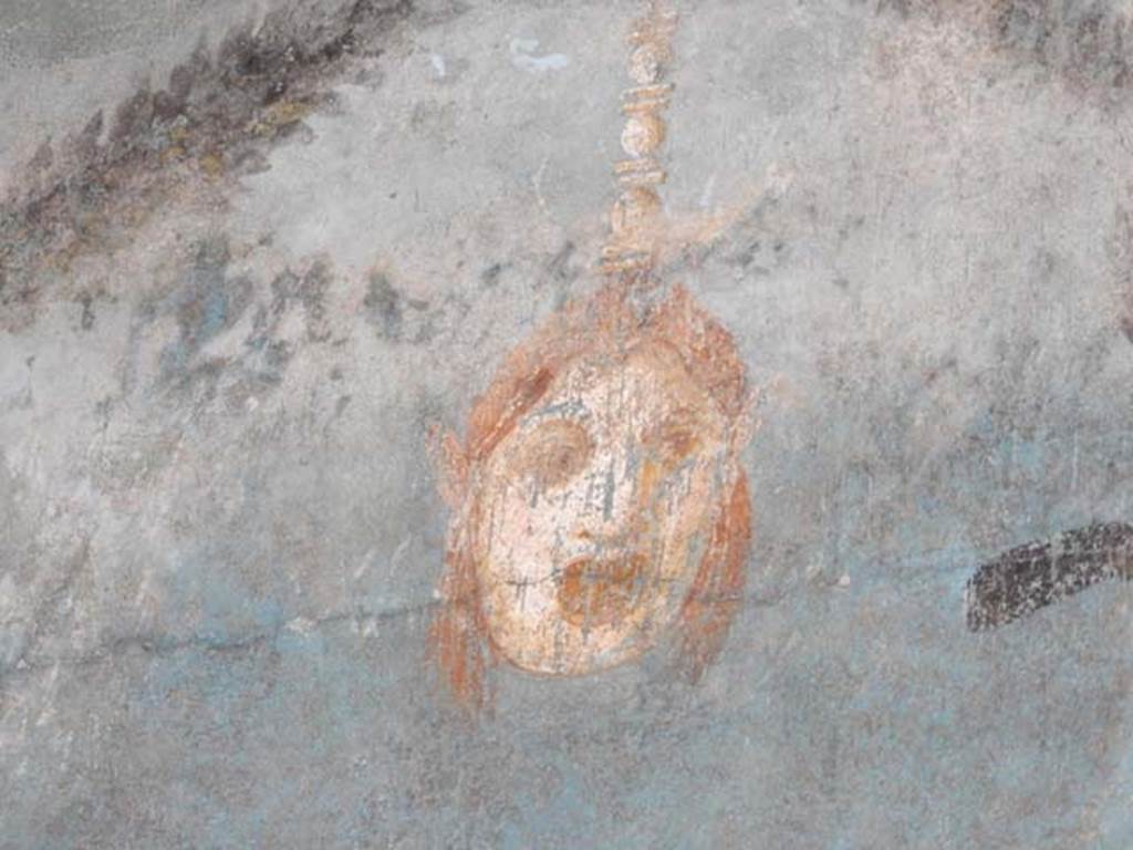 I.9.5 Pompeii. April 2022. Room 5, detail of painted decoration from south end of upper east wall. Photo courtesy of Johannes Eber.