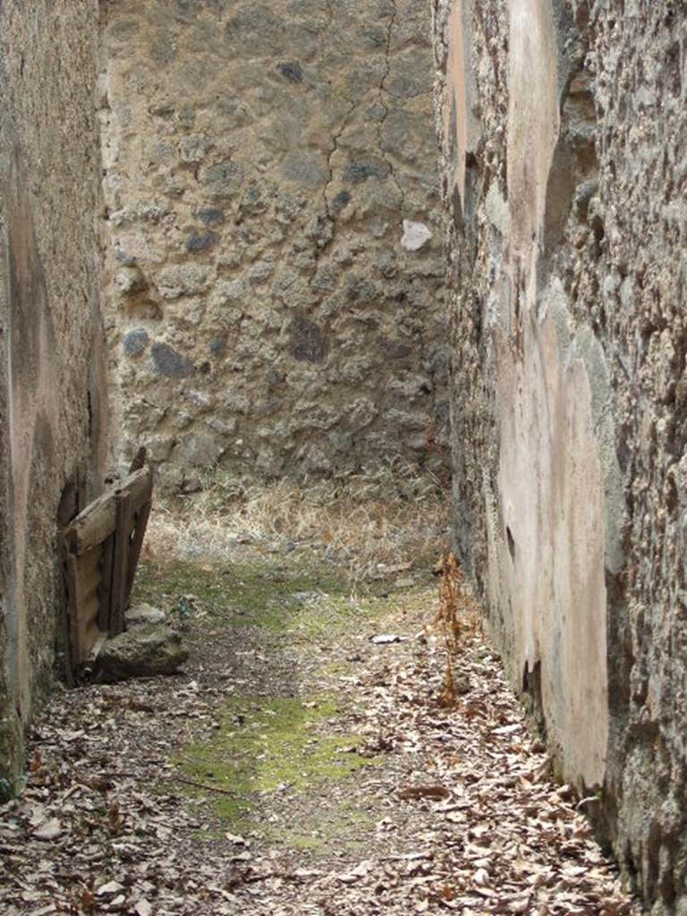 I.10.4 Pompeii. December 2006. Corridor M to kitchen area. Looking west.