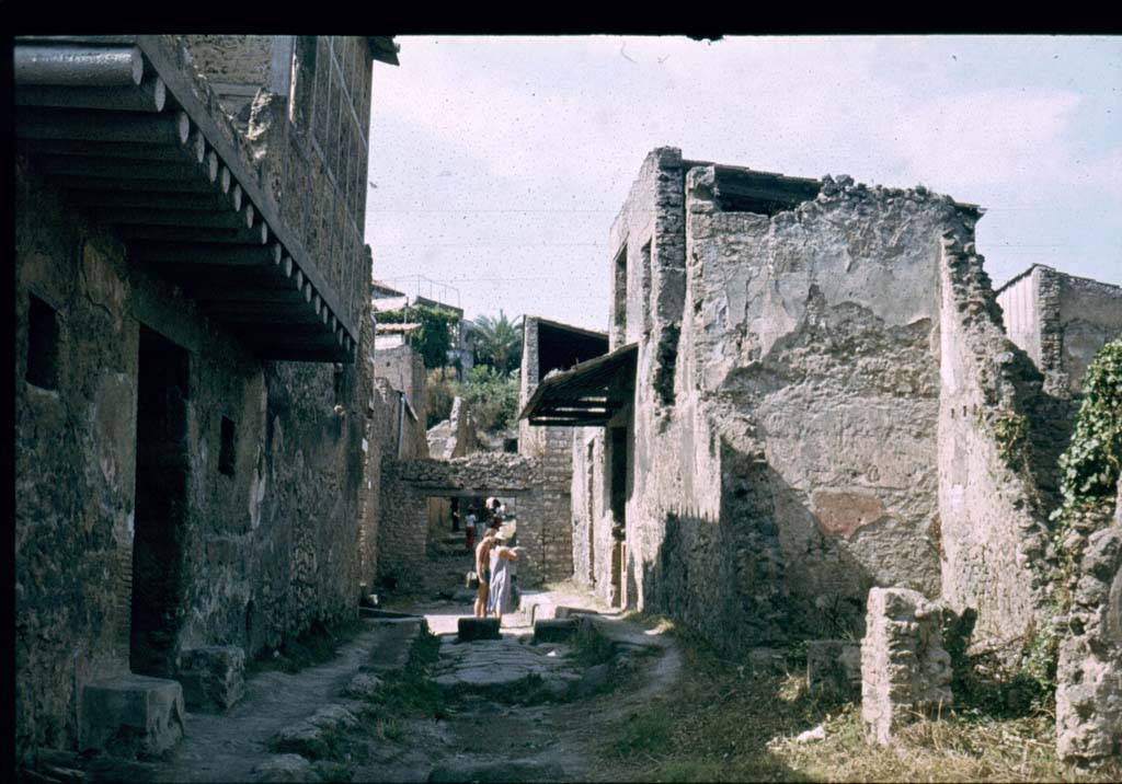 I.10.18 Pompeii, on left.                       Looking north along roadway.                                   I.7.15/16/17 on right.
Photographed 1970-79 by Günther Einhorn, picture courtesy of his son Ralf Einhorn.
