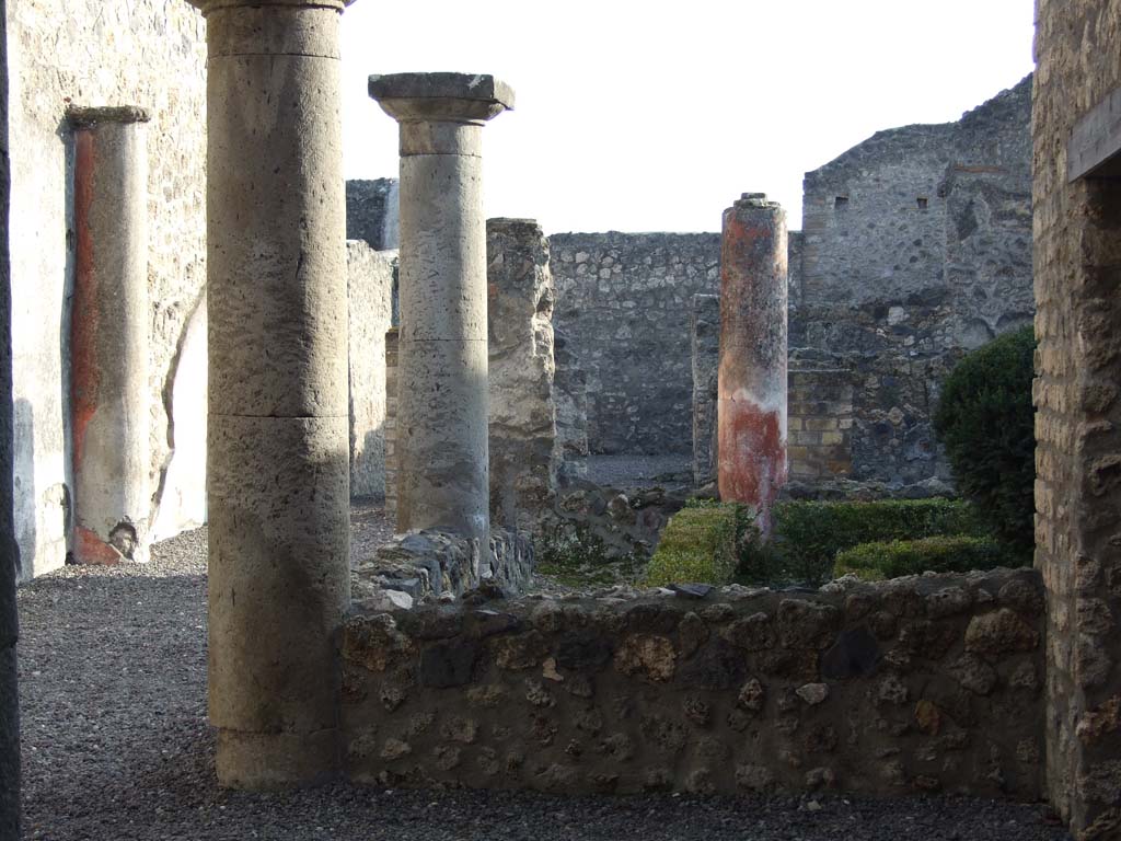 I.13.1 Pompeii. December 2007. Peristyle and garden area.
According to Jashemski, the small peristyle garden was at the front of the house.
It had a portico on the south, east and part of the north sides.
It was supported by 3 columns, an engaged column on the south-west corner, and a pillar on the south-east corner.  
The garden was enclosed by a low wall.
See Jashemski, W. F., 1993. The Gardens of Pompeii, Volume II: Appendices. New York: Caratzas. (p.56)
