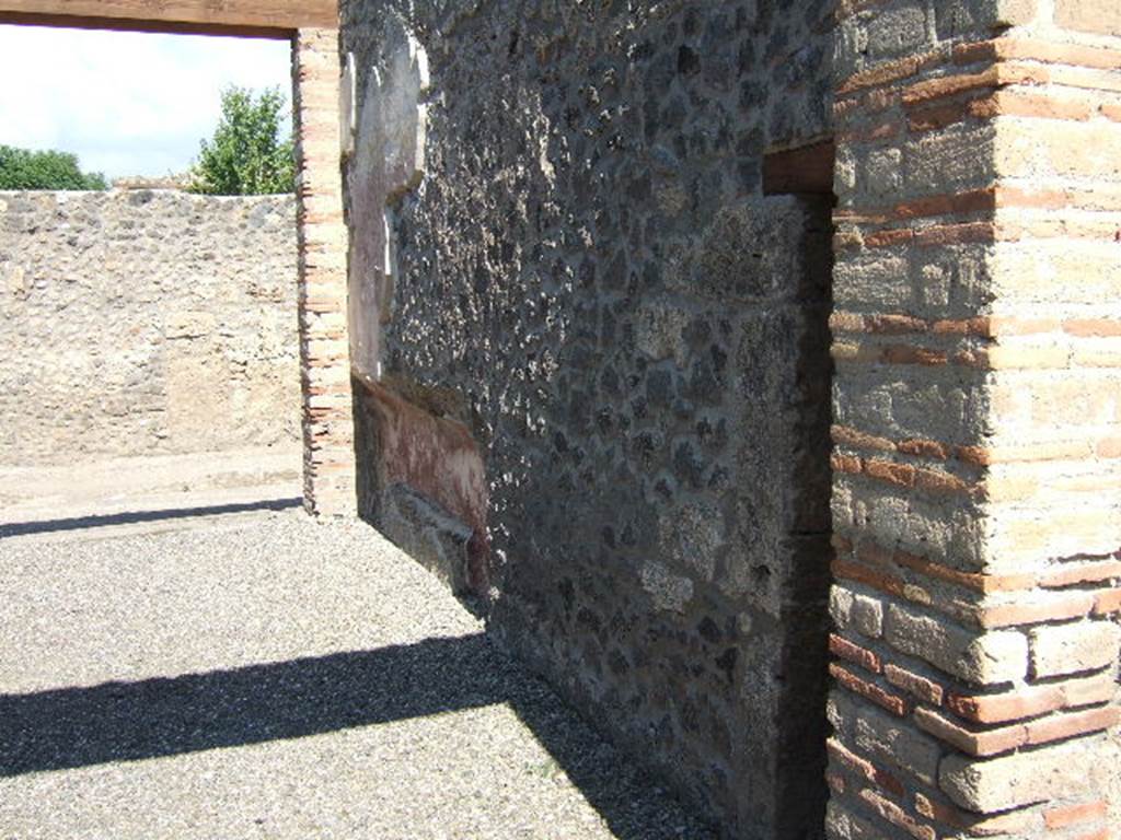 I.16.1a Pompeii. September 2005. Looking north from I.16.2, along east wall.