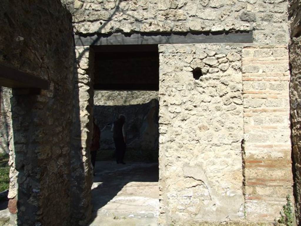 II.1.12 Pompeii. March 2009. South doorway to sacellum or shrine, on east side of peristyle.