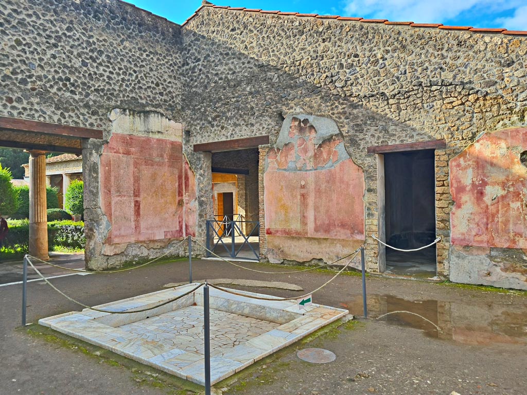 II.3.3 Pompeii. March 2024. 
Room 2, looking towards south-west corner of atrium, with doorway into room 11, on left, and rooms 5 and 6, on right.
Photo courtesy of Giuseppe Ciaramella.
