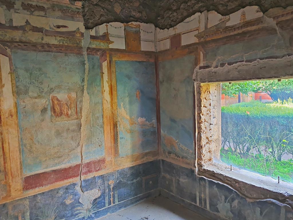 II.3.3 Pompeii. March 2024. Room 10, south-west corner and west wall with window. Photo courtesy of Giuseppe Ciaramella.