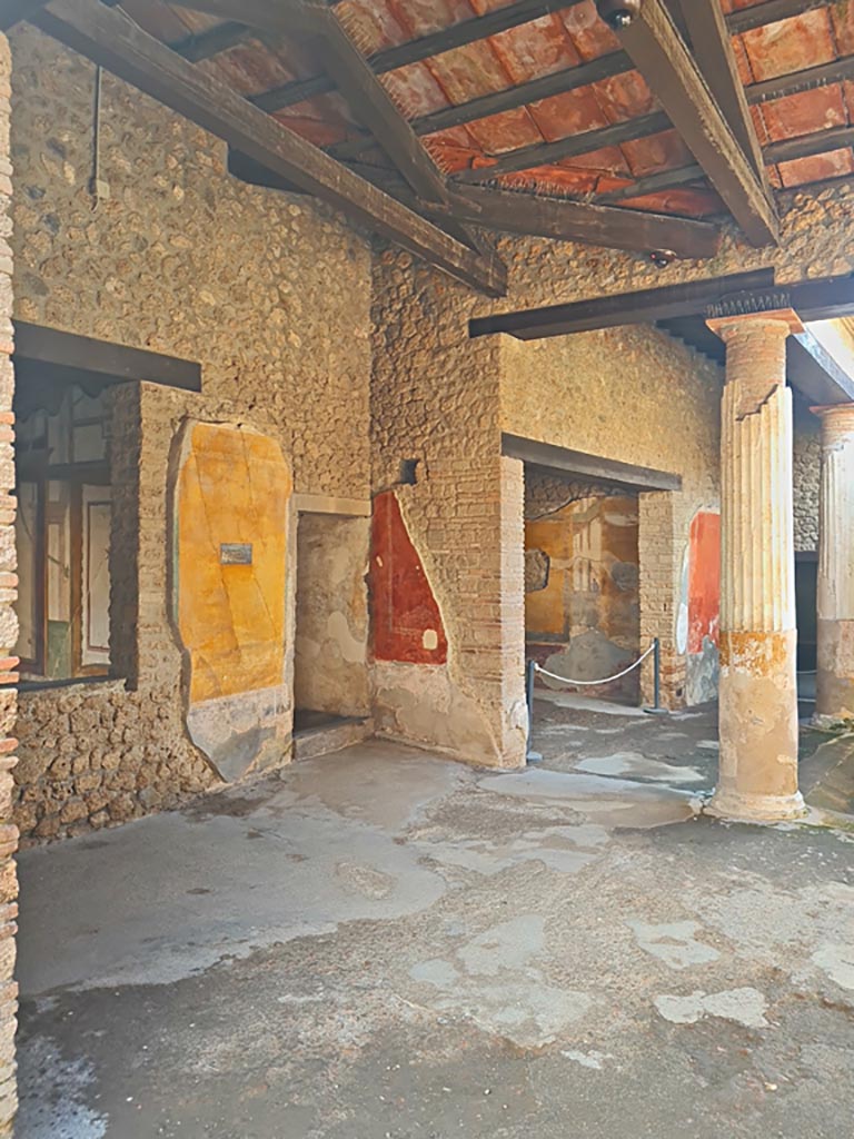 II.3.3 Pompeii. March 2024. Room 11, north-east corner, with doorways to rooms 8 and 9. 
The window, on the left, is into room 4. Photo courtesy of Giuseppe Ciaramella.

