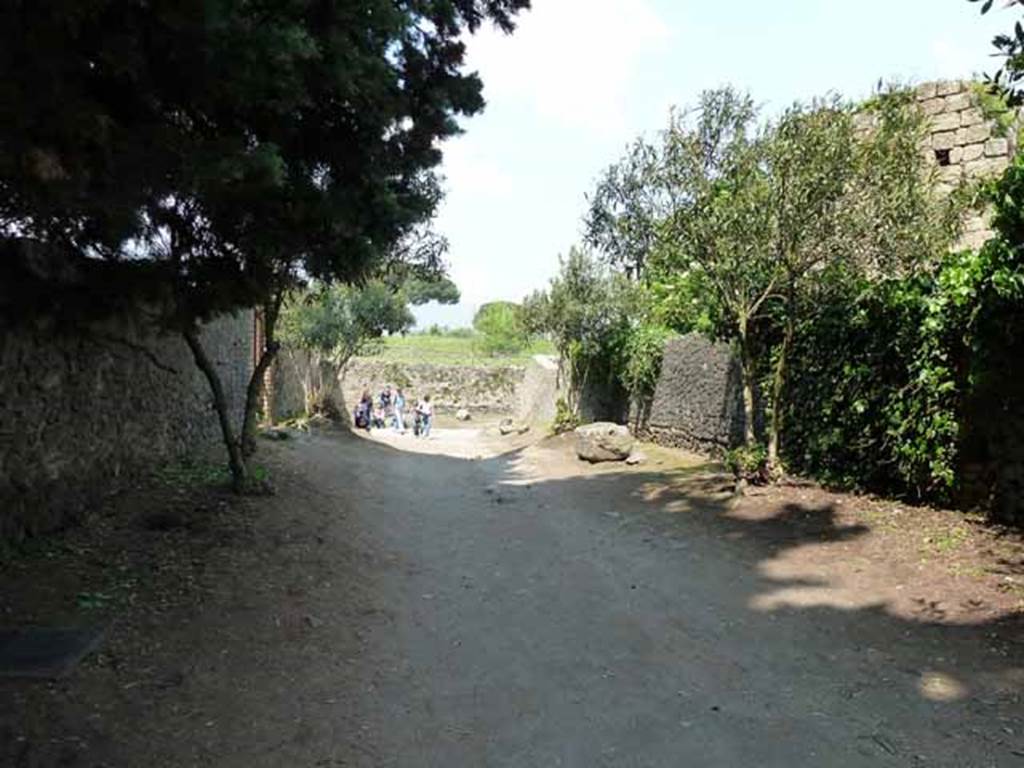 II.4. Pompeii. May 2010.   Vicolo dell’Anfiteatro, looking north  between II.4 and II.5