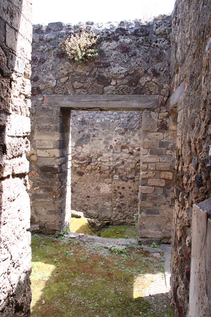 V.1.7 Pompeii. May 2024. 
Looking south towards doorway to room “i”. Photo courtesy of Klaus Heese.
