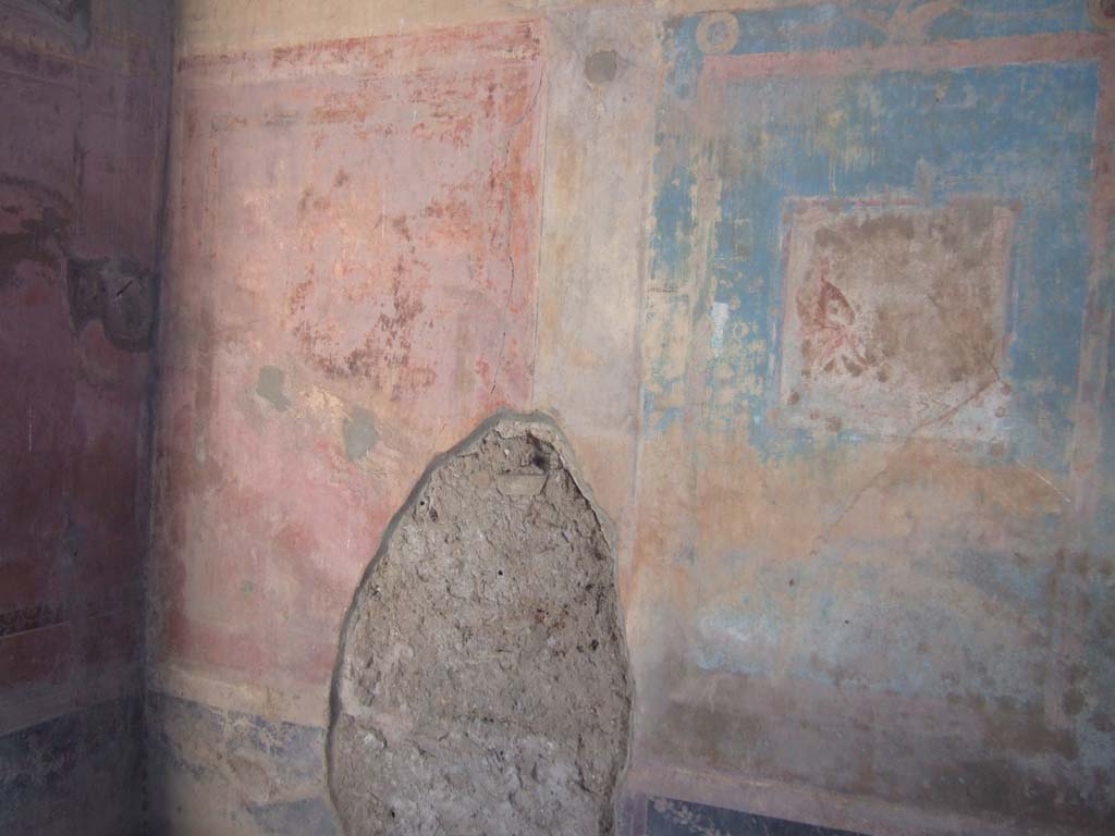 VI.2.14 Pompeii. September 2005. West wall of triclinium, south side of central blue panel.