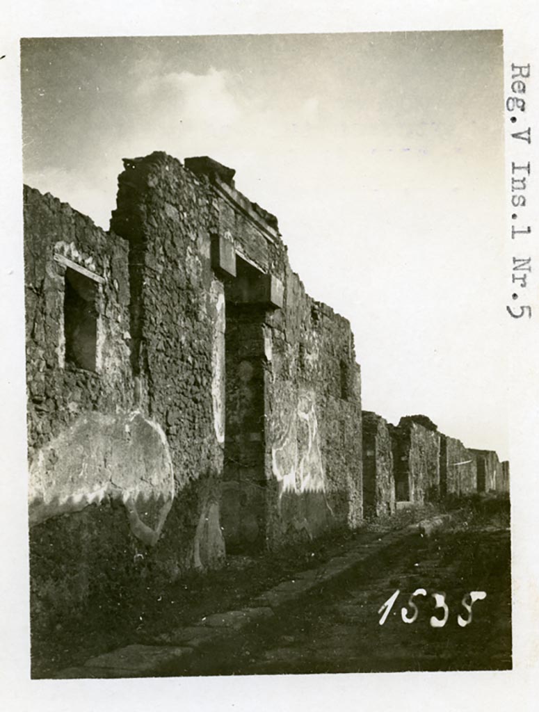 VI.5.4 Pompeii but shown as V.1.5 on photo. Pre-1937-39. 
Looking south to entrance doorways on Vicolo di Modesto.  
Photo courtesy of American Academy in Rome, Photographic Archive. Warsher collection no. 1535.
