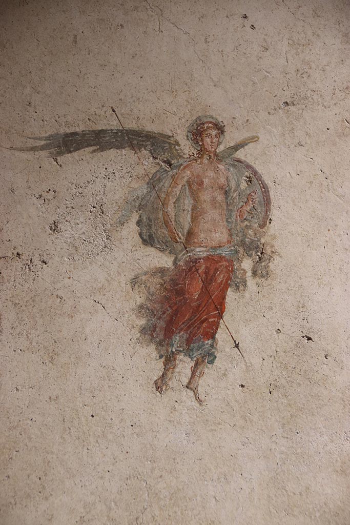 VI.15.1 Pompeii. October 2024. 
Detail of painted figure from central panel on west wall. Photo courtesy of Klaus Heese.
