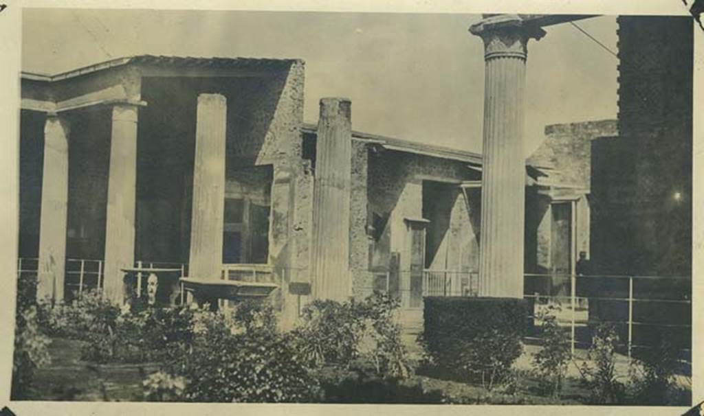 VI.15.1 Pompeii, 29th March 1922. Looking north-east across peristyle towards north side of atrium area. Photo courtesy of Rick Bauer.
