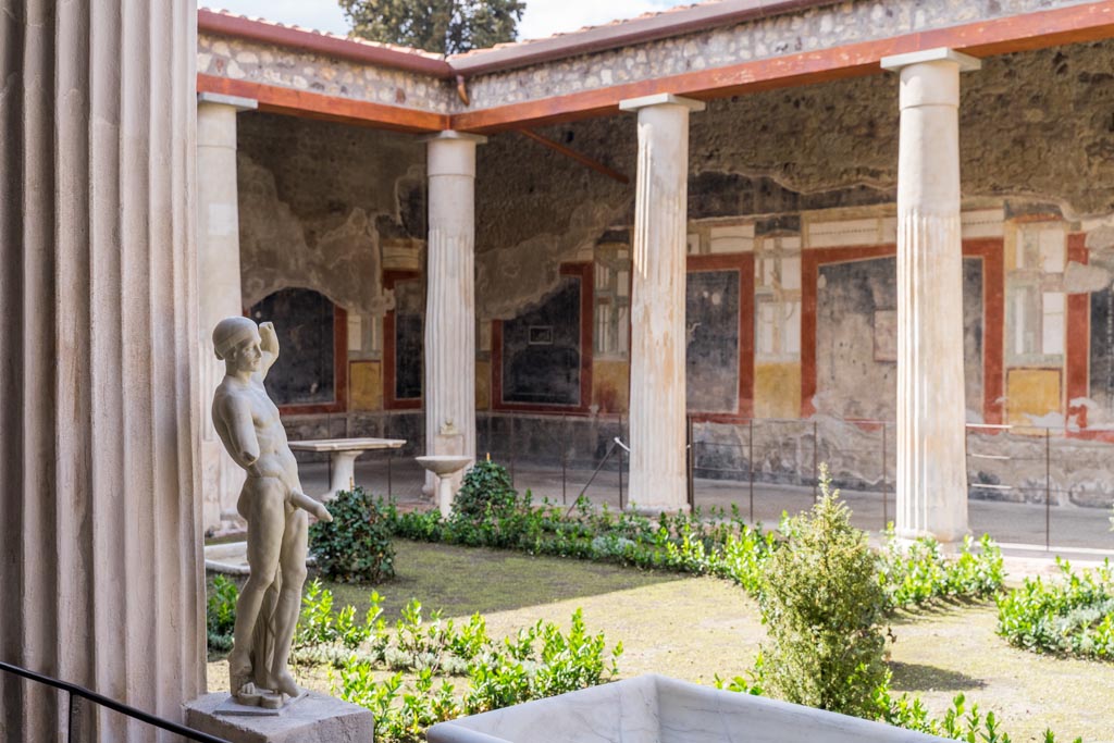 VI.15.1 Pompeii. March 2023. Looking towards south-west corner of peristyle from east portico. Photo courtesy of Johannes Eber.