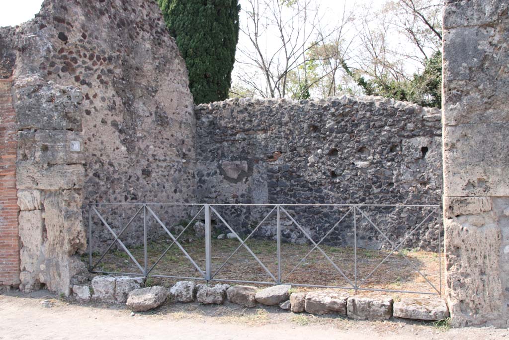 VI.17.18 Pompeii. September 2021. Looking west to entrance doorway of shop on Via Consolare. Photo courtesy of Klaus Heese.