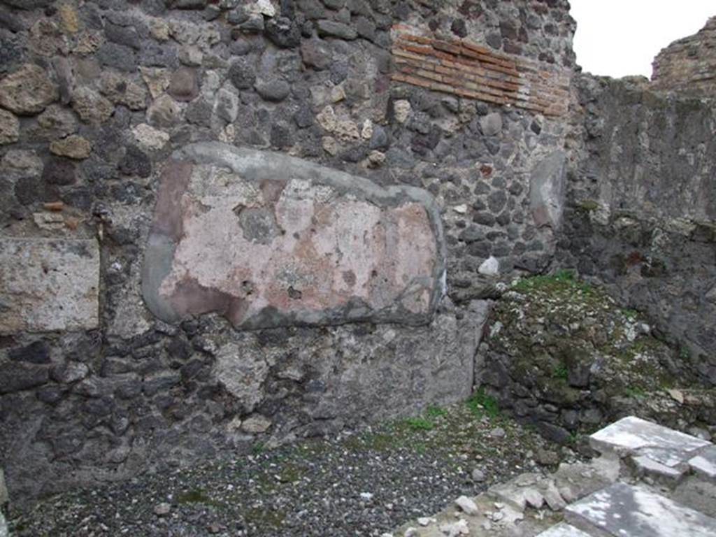 VI.17.31 Pompeii. December 2007. South wall of shop with remains of stone staircase in south-west corner, on right.