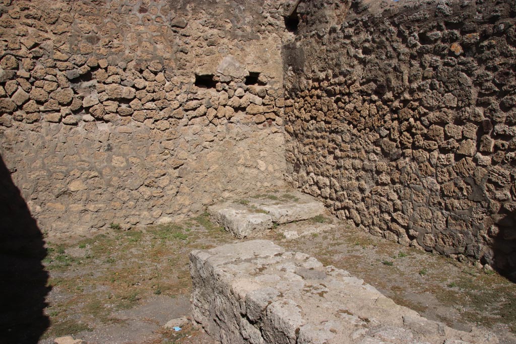 VII.7.3 Pompeii. October 2023. Looking towards north-east corner with base of steps to upper floor. Photo courtesy of Klaus Heese.