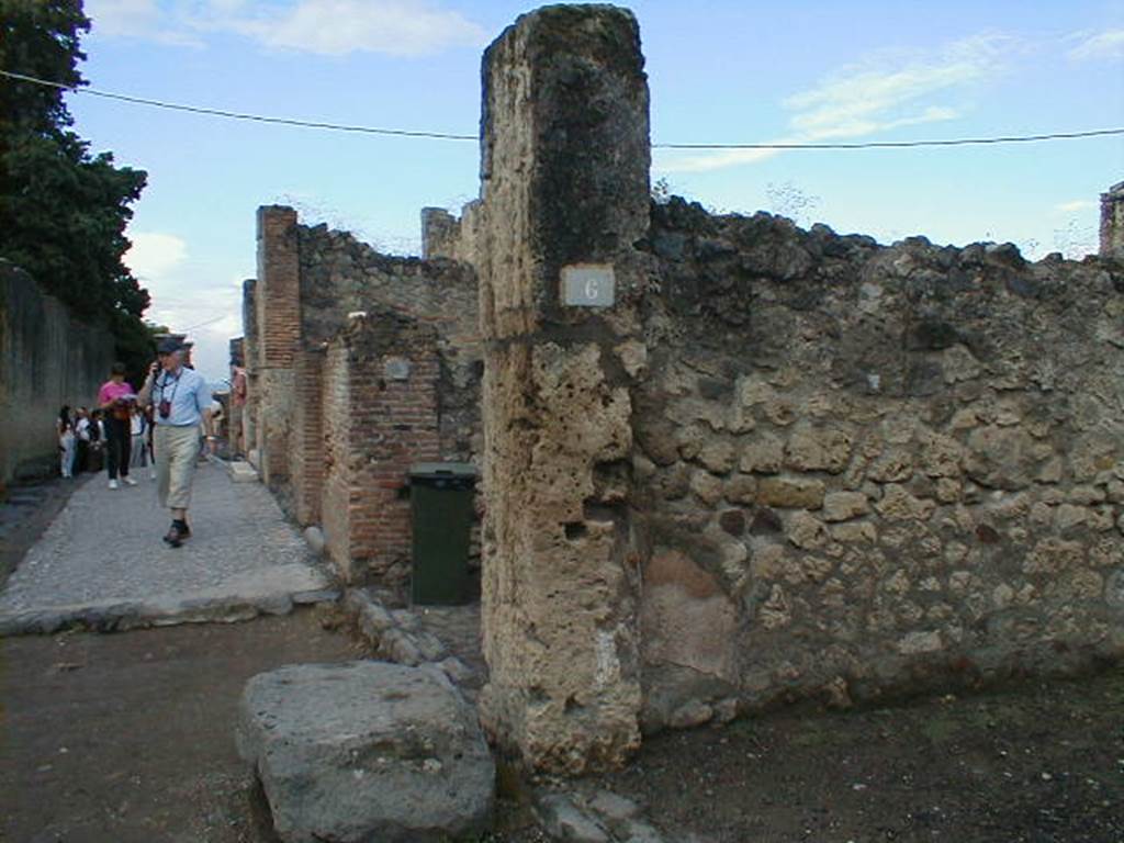 VII.7.6 Pompeii. September 2004. Looking west across entrance on Via Marina.