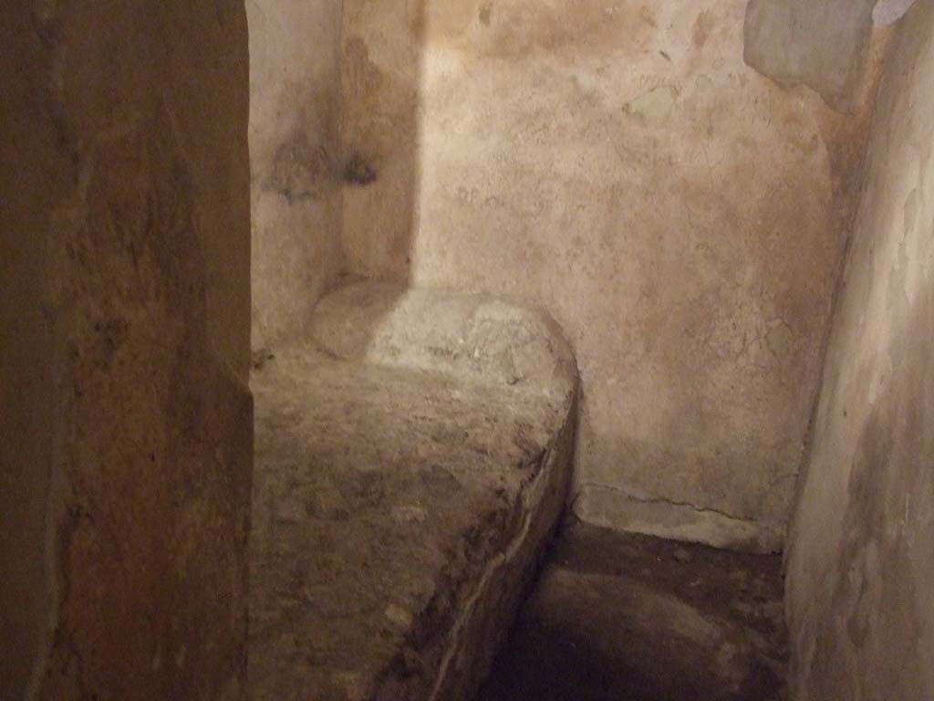 VII.12.18 Pompeii. December 2006. Prostitutes room with stone bed.