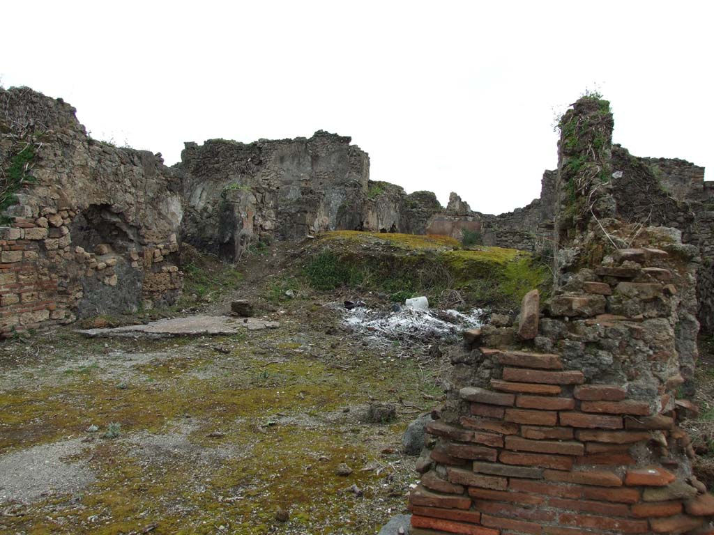 VII.12.35 Pompeii. March 2009. Looking east into remains of Inn.