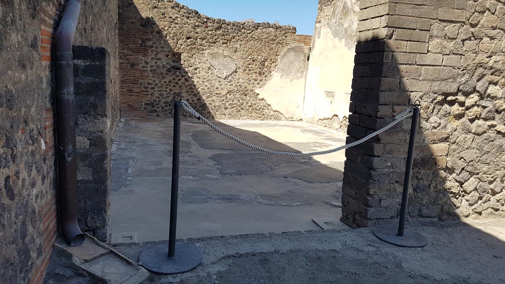 VIII.2.14 Pompeii. August 2023. 
Looking west through doorway to room in south-west corner of atrium. Photo courtesy of Maribel Velasco.
