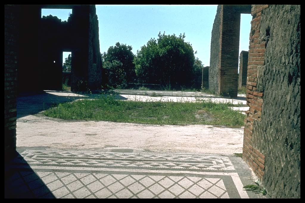 VIII.2.16 Pompeii. Looking west from fauces across atrium towards rear garden area.
Photographed 1970-79 by Günther Einhorn, picture courtesy of his son Ralf Einhorn.
